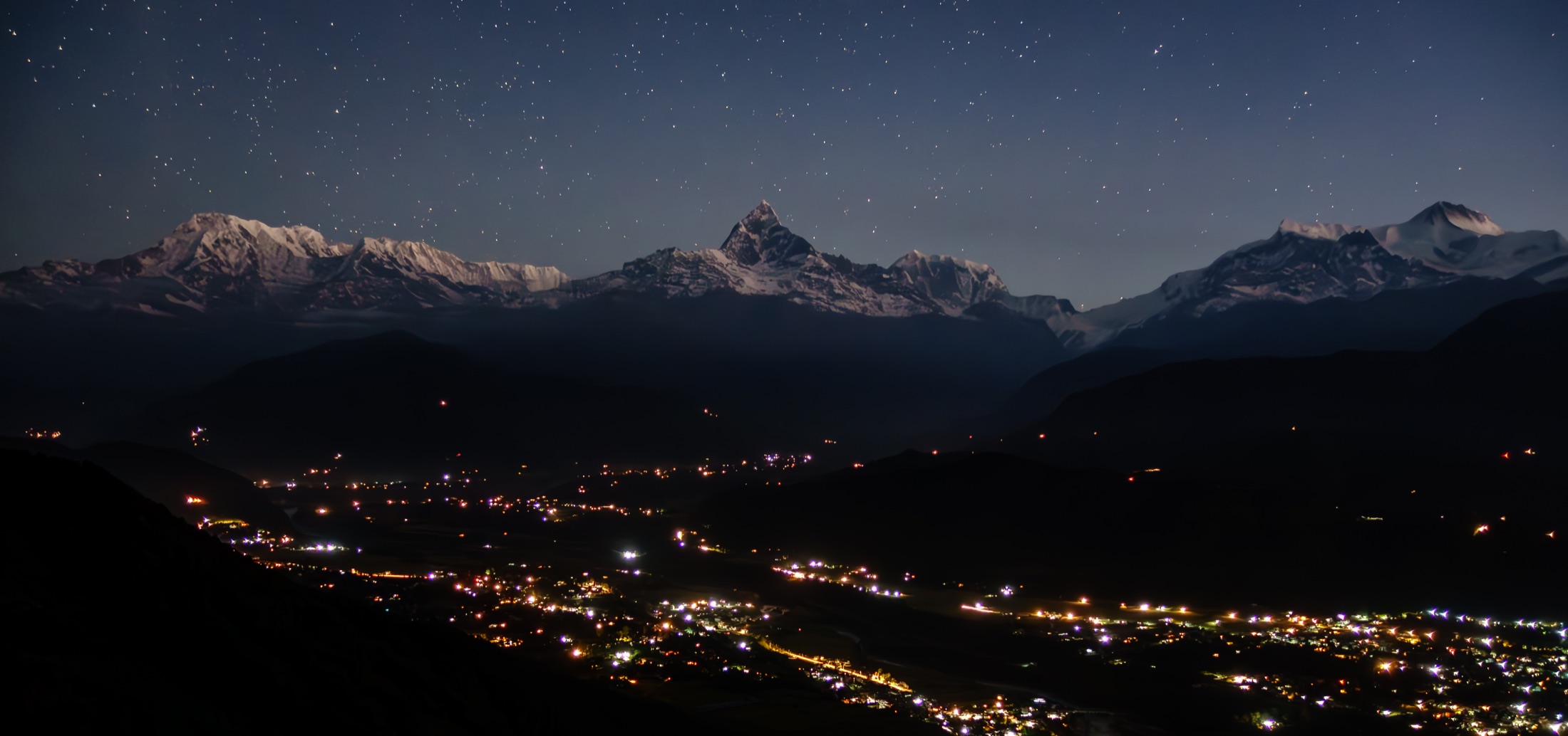 Annapurna mountains under a starry sky